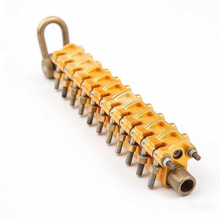 Close-up of a gold-toned excavator hydraulic valve bank with multiple valves, bolts, and a D-ring, highlighting robust industrial construction.