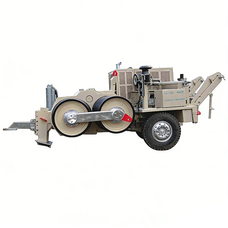 Heavy-duty hydraulic cable puller with large reels, wheeled chassis, used in power line installation projects.