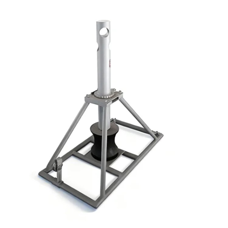 Rugged metal excavator lifting tripod attachment with vertical pole, pulley, and square base for heavy load hoisting on construction sites.