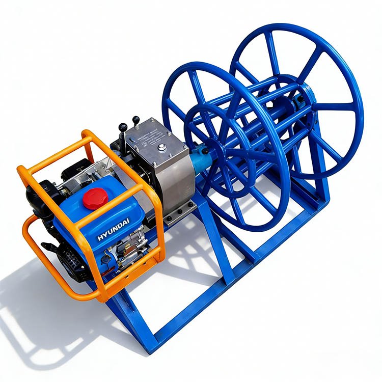 Portable gas winch with blue steel cable reel, orange engine frame, and blue base, built for heavy-duty cable handling tasks.