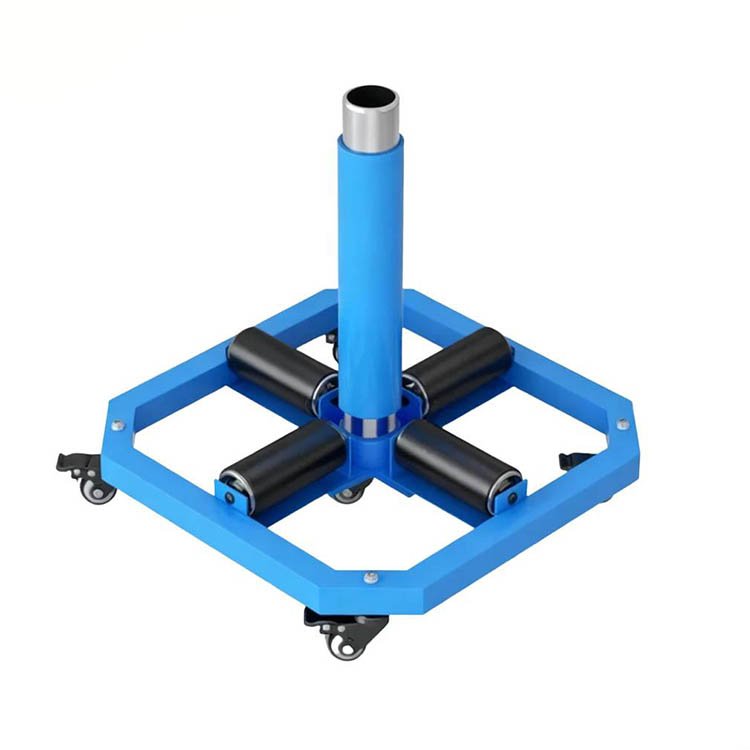 Blue excavator pipe roller attachment with four black rollers, central metal pipe, and wheeled base for easy job site maneuvering