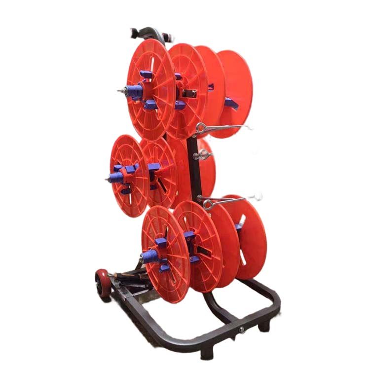 Blue multi-spool hose reel trolley with handle, red wheel, and multiple blue spools for organized hose storage, suitable for irrigation or industrial use.