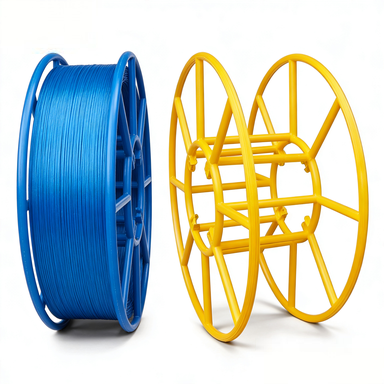 loaded blue wire reel beside yellow empty steel reel