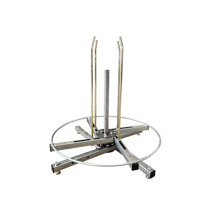 Wire payout spinner stand with blue fence wire coil