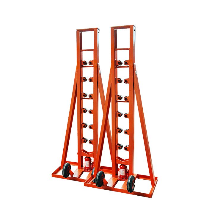 Orange cable drum stand with hydraulic lifting jack